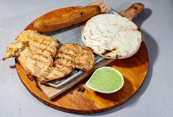 meat cutlet with arepa, ripe banana