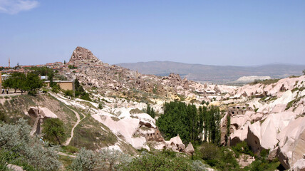 Uchisar Castle and special stone formation of  Cappadocia in Nevsehir, Turkey. Cappadocia is part of the UNESCO World Heritage Site.