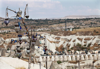 Evil eye in tree behind Zelve Valley in Cappadocia, Nevsehir, Turkey. Cappadocia is part of the UNESCO World Heritage Site.