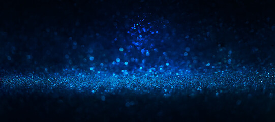 Blurred blue bokeh with glitter