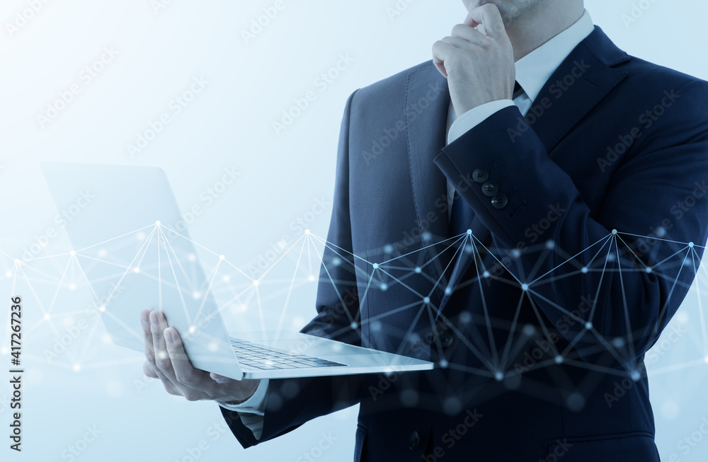 Fototapete businessperson using internet and thinking. network structure and gray background.