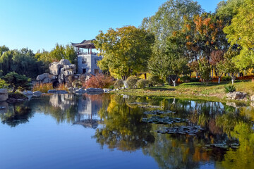 Fototapeta na wymiar chinese garden with pavilion and lake