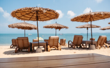 Wooden table and chairs at tropical beach cafe