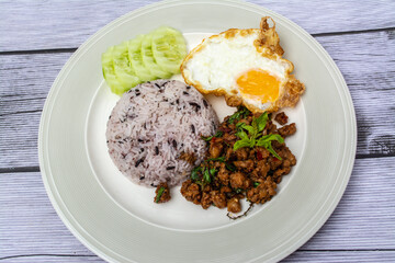 Rice with Stir Fried Chili, Pork, Fried Egg, Delicious. It is a popular for Thai Food 