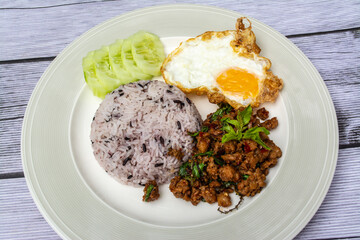 Rice with Stir Fried Chili, Pork, Fried Egg, Delicious. It is a popular for Thai Food 