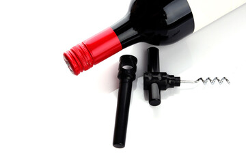 bottle of wine and a corkscrew