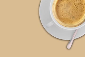 Top view latte, cappuccino coffee in white cup on brow background. With copy space