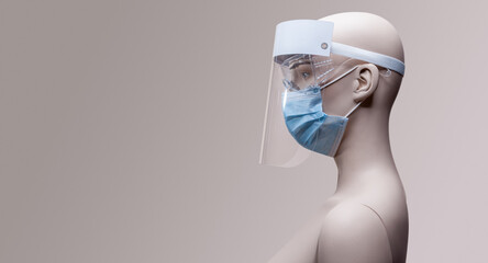 Dummy with protective equipment on the head against COVID-19