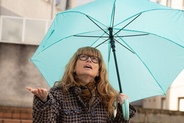 woman on the street with umbrella outdoors