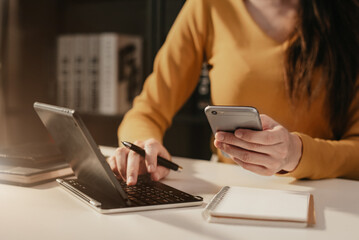 Fototapeta premium Business concepts, business people working in the work area with smartphones and data sheets at the desk.