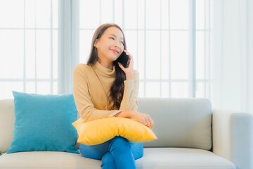 Portrait beautiful young asian woman with smart mobile phone