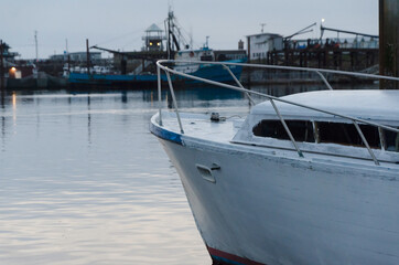 Fototapeta premium Weathered old boat parked in Westport Cove