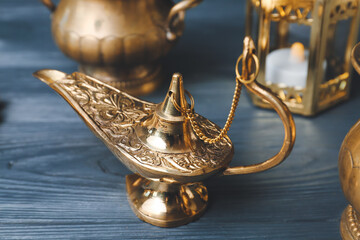 Aladdin lamp of wishes on table