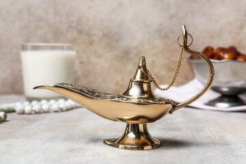 Aladdin lamp of wishes on grey background