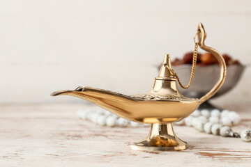 Aladdin lamp of wishes on light table