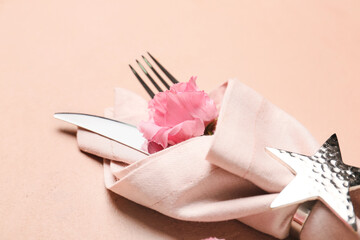 Cutlery for festive table setting on color background