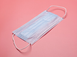 health care face mask isolated on pink background