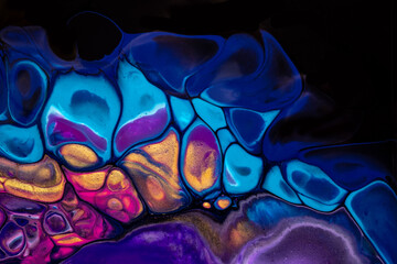 Bright abstract fluid art on black background dark purple and blue colors.