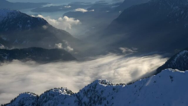The Breathtaking Salmon Inlet In British Columbia, Canada Surrounded With Snowy Mountains Reaching The Sky - Aerial Shot