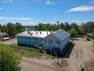 Aerial view of a kindergarten in the village of Sidorovka (Kirov, Russia)