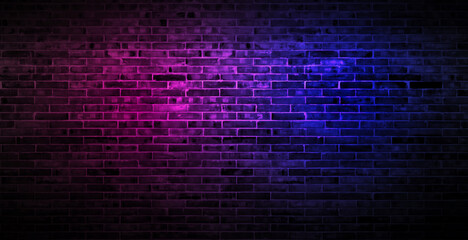 Black brick wall background rough concrete with neon lights and glowing lights. Lighting effect...