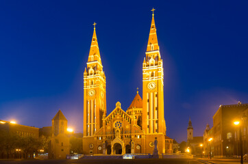 Illustration of view on Cathedral in night light of Szeged in Hungary.
