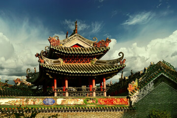 Naklejka premium Zumiao Ancestor's Temple is a Daoist temple in Foshan, Guangdong, China. The temple was converted into Municipal Museum and listed as one of the main cultural relics. Typical Lingnan style roofs.