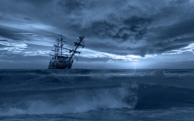 Sailing old ship in a storm sea in the background stormy clouds