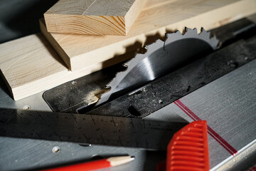 Fototapeta na wymiar Carpentry. Workshop tools. Table circular saw, timber, pencil and ruler