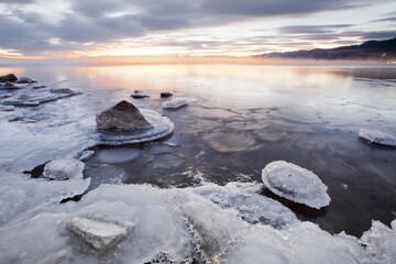 Ice and sun on the autumn freezing Lake Baikal.