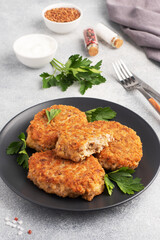 Buckwheat cutlets with cheese and parsley on a plate. Healthy diet food
