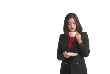 Asian business woman is holding a cup of coffee and looking it. On white Background.