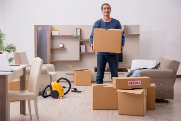 Fototapeta premium Young man moving to new flat