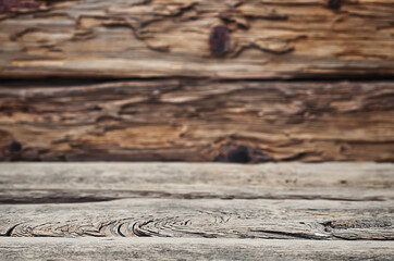 Empty wooden table in front of blurred background. Mock up for display of product