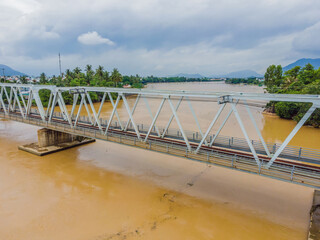 Aerial view of railway bridge over the river