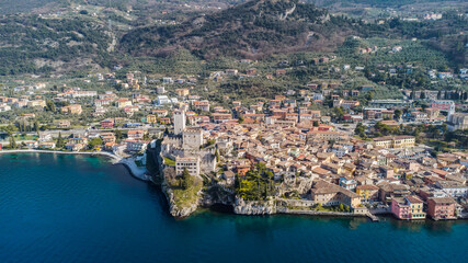 Fototapeta na wymiar Incredible aerial view of the Medieval Castle of Malcesine on the shores of Lake Garda.