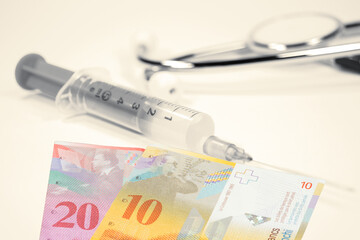 Geld Schweizer Franken und Impfung gegen Corona Virus