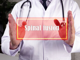 Healthcare concept about Spinal fusion with phrase on the piece of paper.