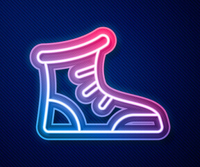 Glowing neon line Sport boxing shoes icon isolated on blue background. Wrestling shoes. Vector.