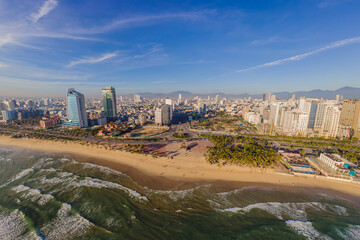 Beautiful My Khe beach from drone in Da Nang, Vietnam, street and buildings near the Central beach and the sea. Photo from a drone