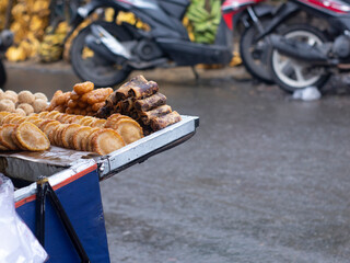 a variety of traditional foods that are served on the edge of the market