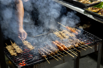 Philippines traditional barbecue stick on the grill