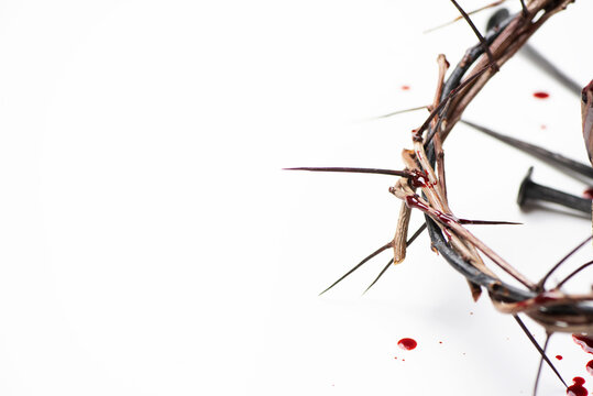 Good Friday, Passion of Jesus Christ. Crown of thorns, hammer, old nail isolated on white. Christian Easter holiday. Top view, copy space. Crucifixion, resurrection of Jesus Christ. Gospel, salvation
