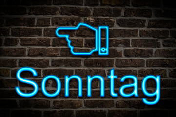 Fototapeta premium Leuchtreklame Sonntag