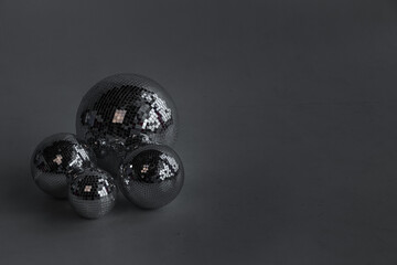 Black and white texture of mirror balls on a gray background.