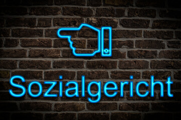Fototapeta premium Leuchtreklame Sozialgericht