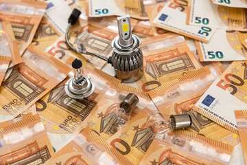 modern car bulbs on 50 euro bills