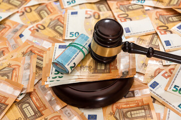 hammer and many 50 euro bills