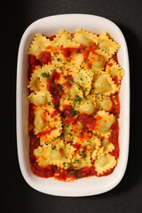 raviolis with tomato sauce andcheese