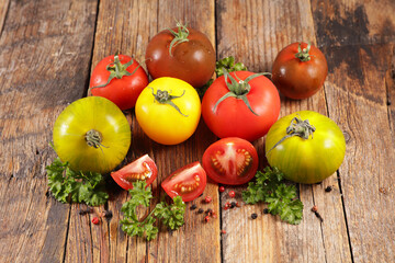 colorful of various tomatoes and herbs
